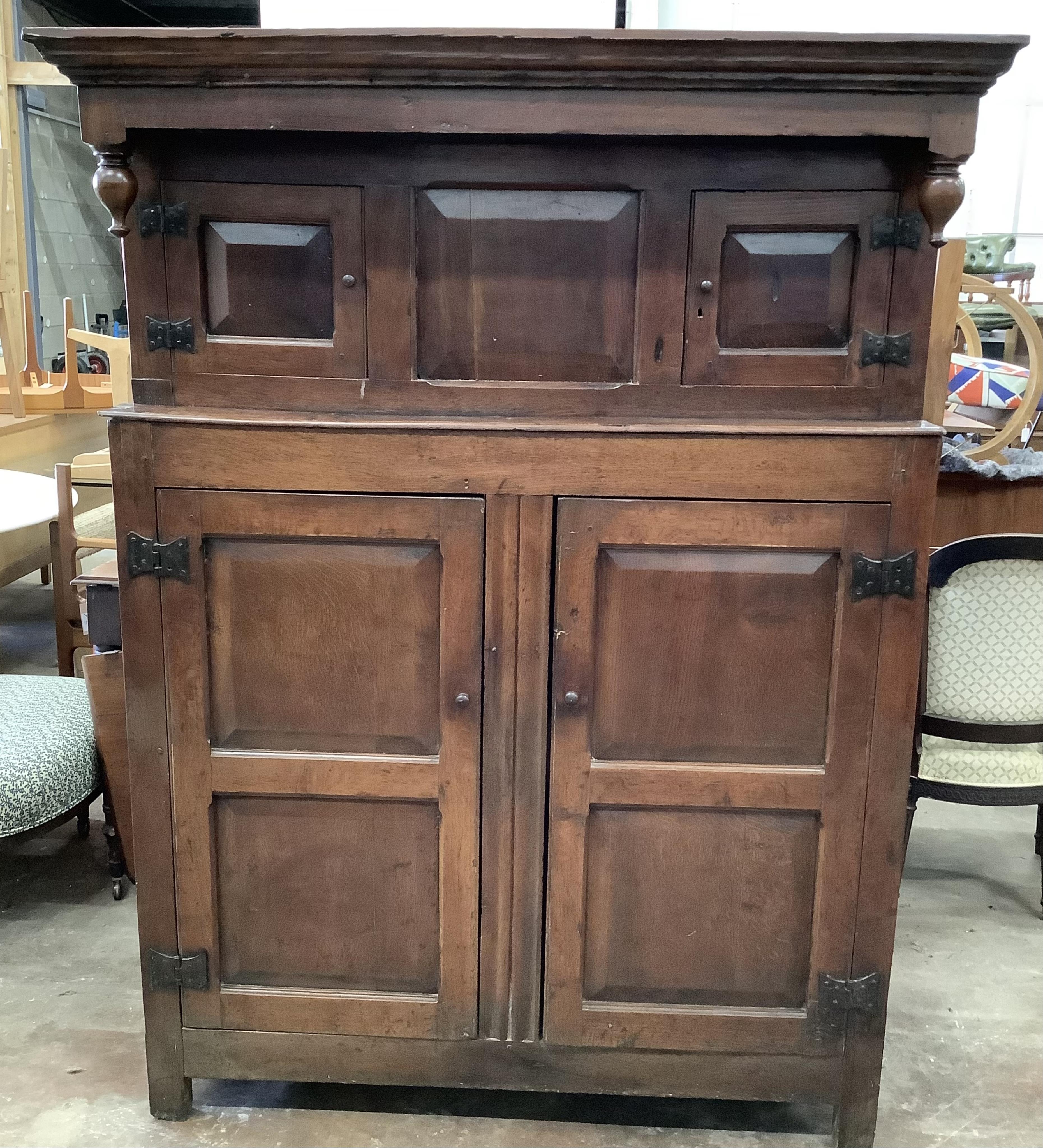 An 18th century oak court cupboard, width 122cm, depth 54cm, height 171cm